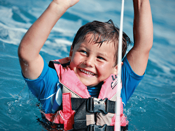 boy playing in water
