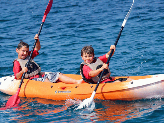 2 boys kayaking