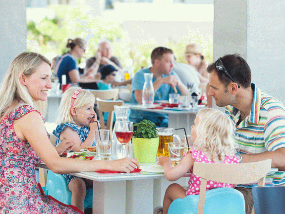 Family eating in restaurant